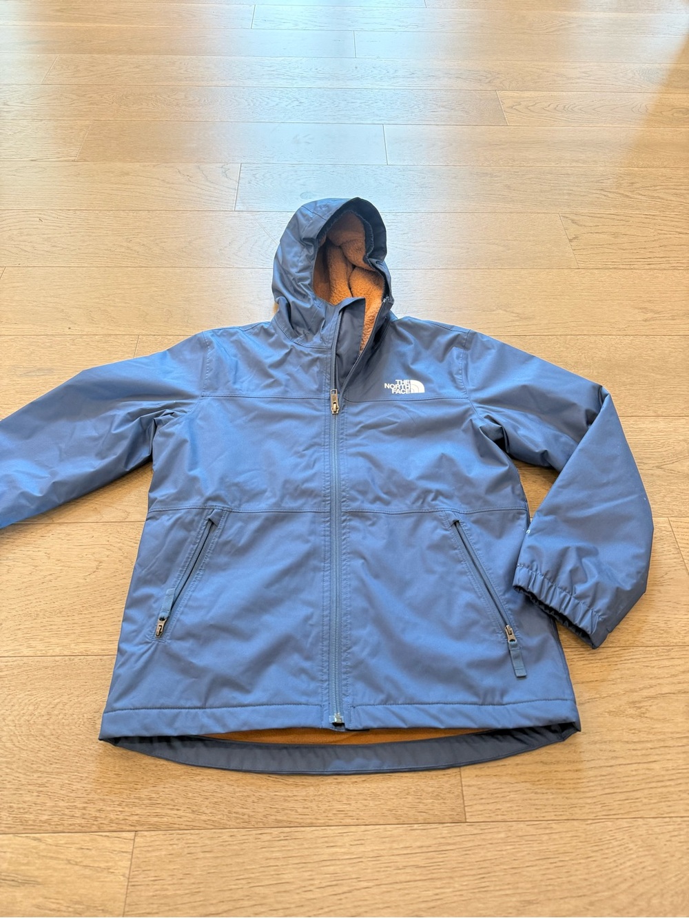 The North Face Kids' Blue Hooded Raincoat with Contrasting Lining